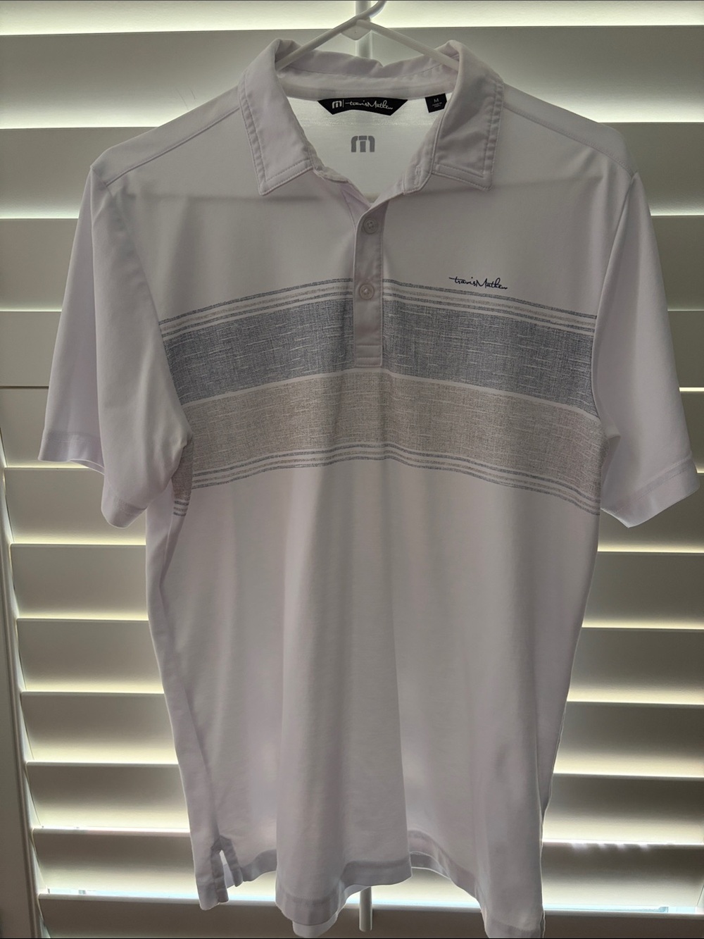 Travis Mathew White Polo with Gray and Tan Chest Stripes